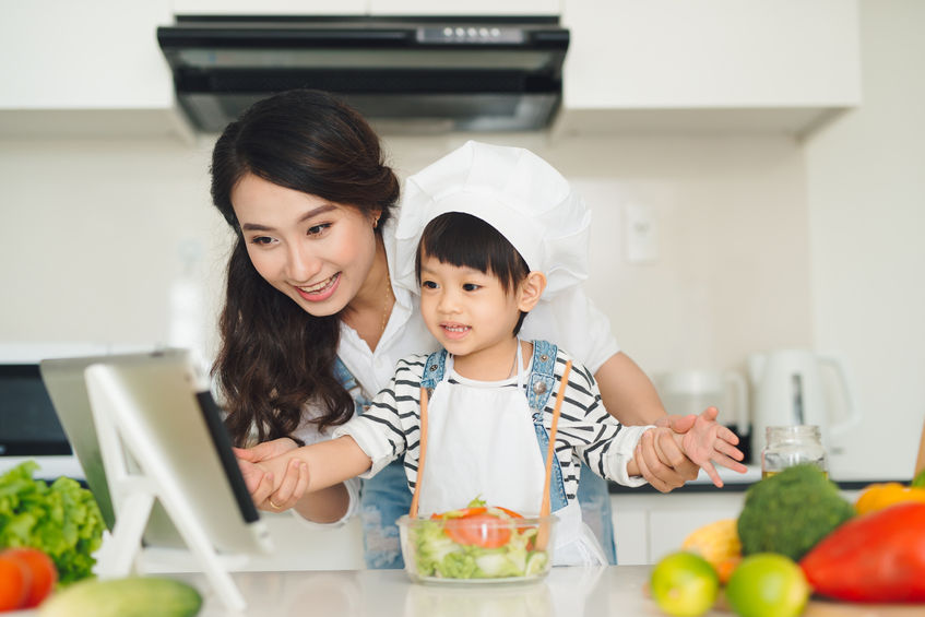 Staying In Shape While COVID-19 Lurks mom and son cooking