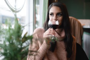 Woman drink red wine