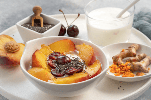 Add a little yogurt to fruit for a yummy meal.