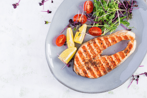 Cooked salmon with side dish